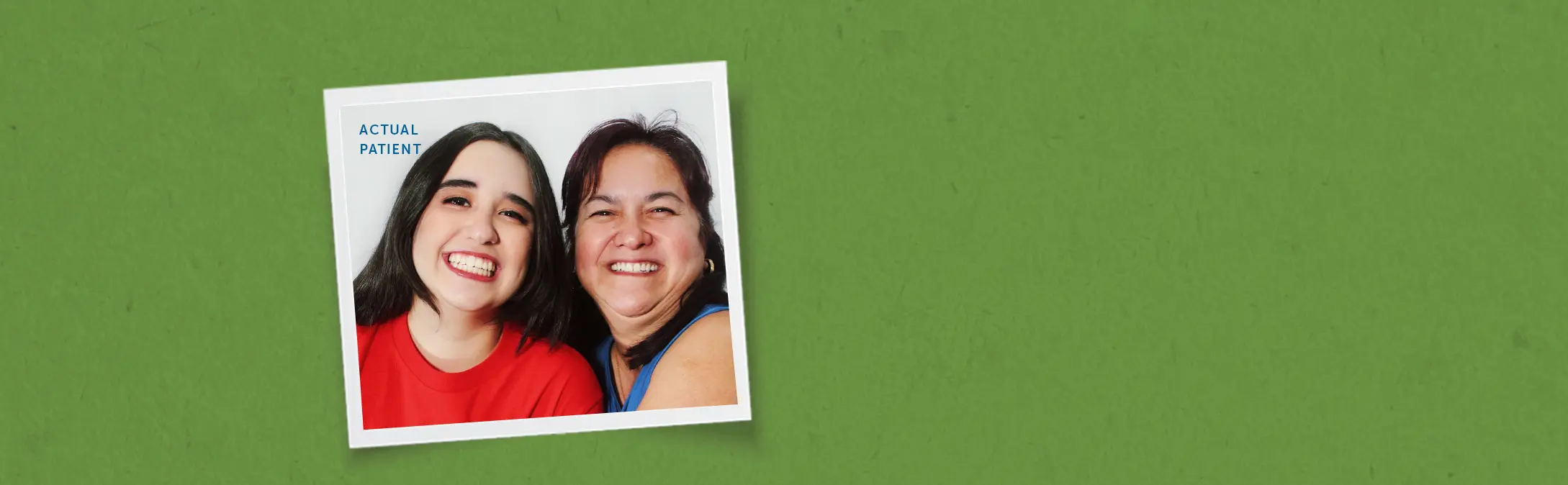 Mom and daughter smiling